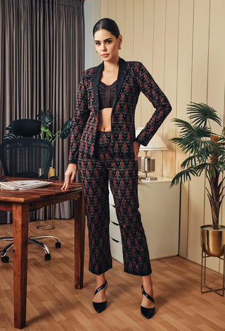 Black co-ord set with intricate Sambalpuri Ikat geometric pattern for a sophisticated look.